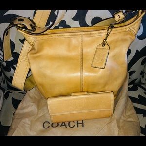 Vintage leather coach bucket bag with wallet